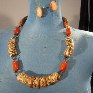 vintage chucky orange necklace and clip glass earrings